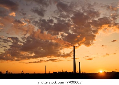 A Nickel Plant With Sunset As Background