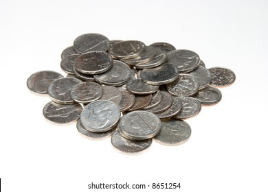 Nickels Dimes Change Silver isolated on white spare change coins piled. Nickel and Dime