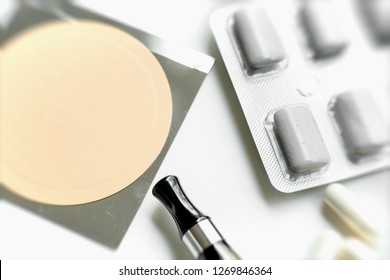 Nicotine Patch, Chewin Gum And Ecigarette Used For Smoking Cessation Isolated On White Background