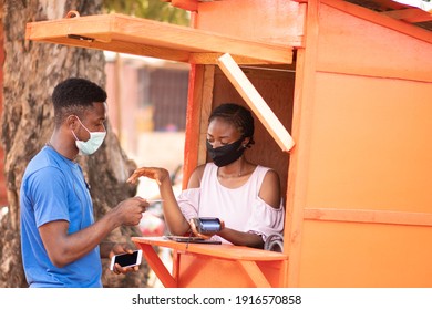 Nigerian Man Using A Pos Service To Withdraw Money