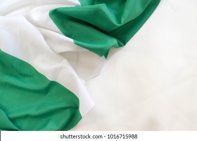 Nigerian National flag isolated on white background diagonally fro independence day concept October first 