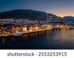 Night aerial of historic city Bergen, Norway colourful wooden harbour 