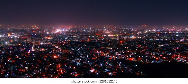 Night Aerial View Of Big City. Streets, Many Historical And Architectural Centers Have Illumination And It's Beautiful. But Look At Gray Sky, Over Such City You Can Never See Stars. Light Pollution