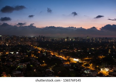 Night Aerial View Of The Jardins Neighborhood In Sao Paulo. The 9 De Julho Avenue Is Highlighted.