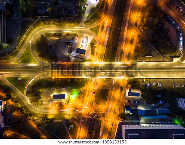 Night aerial view to road\
bridge in Kharkiv, Ukraine. Komunalnyi overpass and Moskovskyi\
avenue crossroad