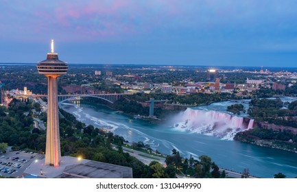 Night aerial view of the Skylon Tower and the beautiful Niagara Falls at Canada - Shutterstock ID 1310449990