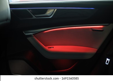 night ambient led light inside of car interior. door card - Shutterstock ID 1691560585