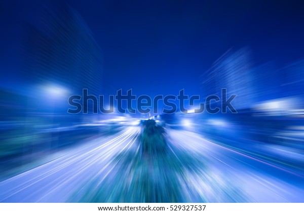 The night avenue with radial blur,\
make a speed fast feel for road view, cool color gives a person a\
kind of mysterious sense of science and\
technology