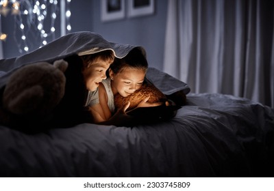 Night, bedroom and siblings with a tablet, online games and bonding with fun, happiness and relax. Children, brother or sister with technology, movies and films with development, home and bed time