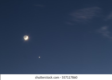 Night blue sky with bright moon and single star - Powered by Shutterstock