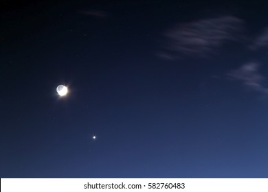 Night blue sky with bright moon and single star - Powered by Shutterstock