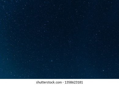 Night blue sky with stars. The texture of a blue sky with stars. - Shutterstock ID 1358623181