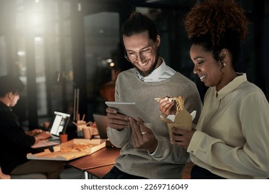 Night business, tablet and people with fast food for planning, web app data and collaboration. Diversity workers, digital technology and eating takeout in dark agency for happy productivity together - Powered by Shutterstock