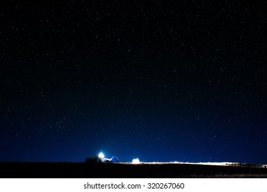 Night Camping Photo With Car And Stars In The Sky 