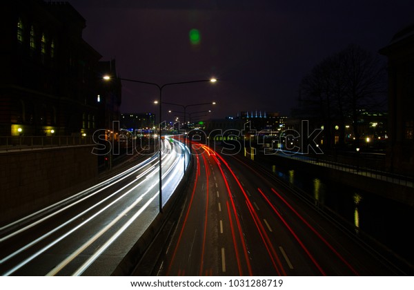 Night city car light\
trails.