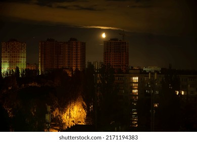 Night City In The Light Of The Moon. Big Moon At Night