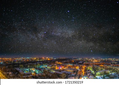 Night City On The Background Of The Starry Sky In Winter