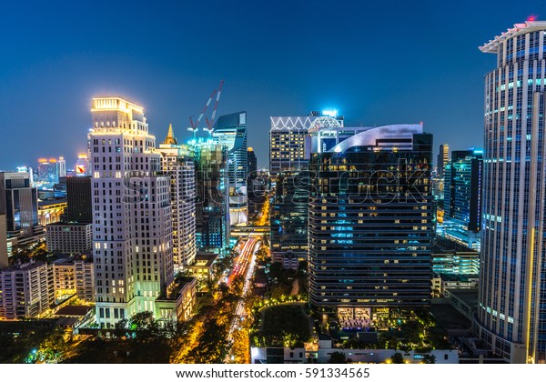 Night city scape in\
Wireless road bangkok
