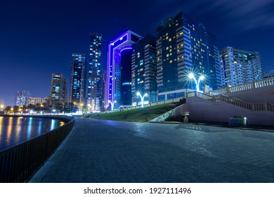 Night City shot with buildings and a bridge 