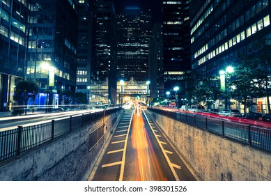 Night City View With Blurs Of Passing Cars
