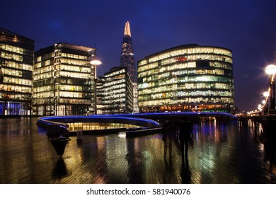 night cityscape of London with office buildings