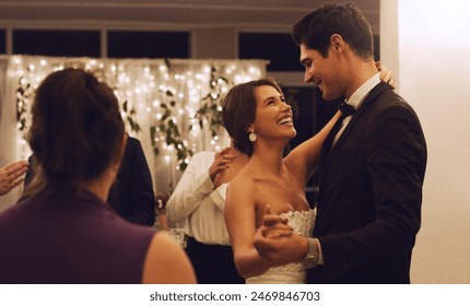 Night, dancing and happy couple with wedding reception for marriage, commitment or celebration. Ceremony, happiness and romantic man with woman bride for relationship, special event or milestone - Powered by Shutterstock