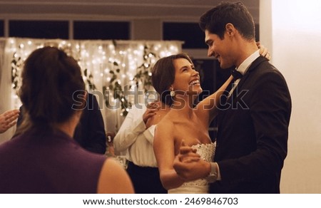 Night, dancing and happy couple with wedding reception for marriage, commitment or celebration. Ceremony, happiness and romantic man with woman bride for relationship, special event or milestone