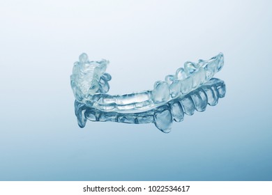 night dental guard by bruxism, blue background
