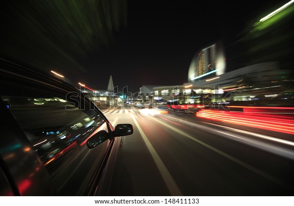 Night drive with car in\
motion.