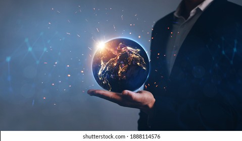 Night earth in the hands of man. Energy savings concept. 
Environmental earth  day.
Elements of this image furnished by Nasa.