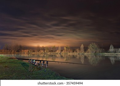 Night Fishing, Carp Rods, Cloudscape Reflection On Lake