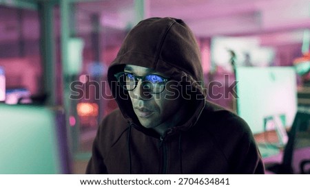 Night, hacker or man with computer for encryption breach, firewall attack or cybersecurity crisis. Confidential info, system access or programmer in dark data center, tech reflection or spyware virus