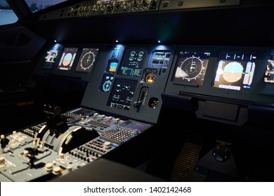 Night Illumination Of Flight Deck With Radar Devices And Displays With Flight Control System On Control Panel