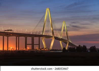 Night image of the Arthur Ravenel Jr. Bridge, a cable-stayed bridge over the Cooper River in South Carolina, connecting downtown Charleston and Mount Pleasant.