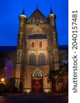 The night image of The Pieterskerk, a late-Gothic church in Leiden dedicated to Saint Peter. It is known today as the church of the Pilgrim Fathers, Leiden, Netherlands