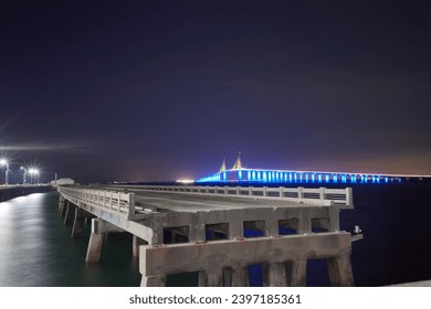 Night landscape of Skyway Fishing Pier State Park is a Florida State Park. The old broken collapsed bridge were left in place and converted into the longest fishing pier in the world.