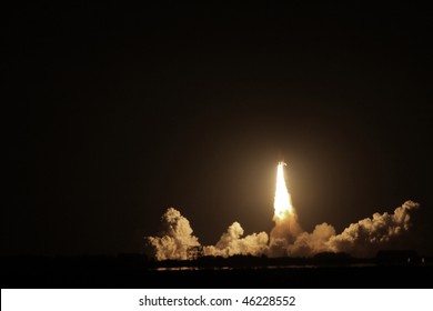 Night launch of Space Shuttle Endeavour as viewed from Titusville, FL near the Indian River - Powered by Shutterstock