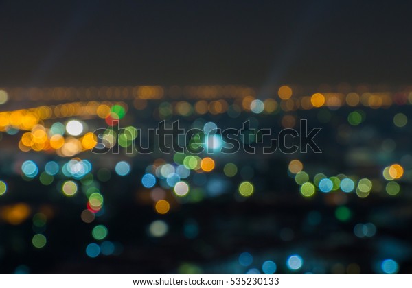 Night life in
cityscape with search lights and lots of venues open like bars and
clubs and dance floors.  Vibrant atmosphere perfect for hitting the
town.  Copyspace room.