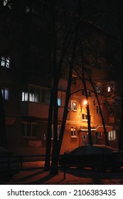 Night Light From Apartment Buildings. Night City. Apartment Entrance. Winter Landscape Of Entrances. Street Photography