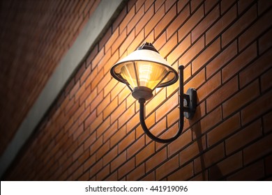 Night Lighting Lamp On The Brick Wall Vintage Style Outdoor Walkway Walking University Or College Space Decoration.