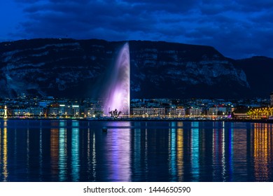The night lights of Geneva lake and city in Switzerland.