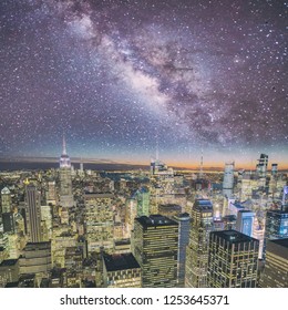 Night Lights Of Midtown Manhattan Skyscrapers. Starry Night Aerial View Of New York City Buildings And Skyline