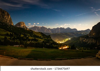 Night Long Exposure Stars Sky Dark Valley Mountains View Through Window Passo Gardena Road Lights, Travel Alto Adige South Tyrol, Italy Tourism, Europe Nature Landscape.