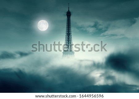 Night with Moon and Eiffel tower in Paris