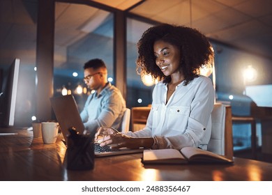 Night, office and woman with laptop at desk for project information, report and overtime at work. Happy, developer and notebook with tech for software development, deadline and open source research
