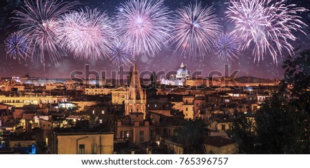 Night panorama of Rome with fireworks on the black sky, Italy