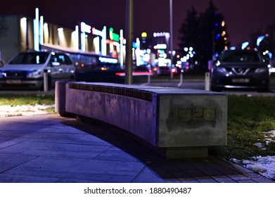 Night photo in city of lights and bench outdoors - Powered by Shutterstock