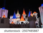 The night photo of Excalibur Hotel and Casino, a popular gambling and entertainment complex in Medieval castle style, at Las Vegas strip, Nevada, USA.
