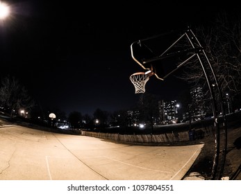 outdoor basketball court at night