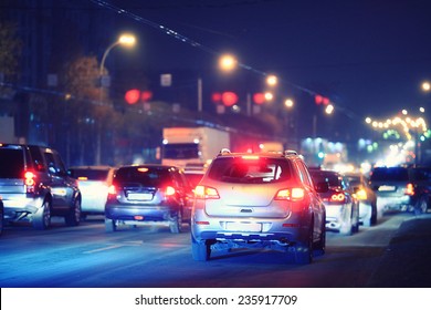 Night Road In The City Of Lights Cars Traffic Jams